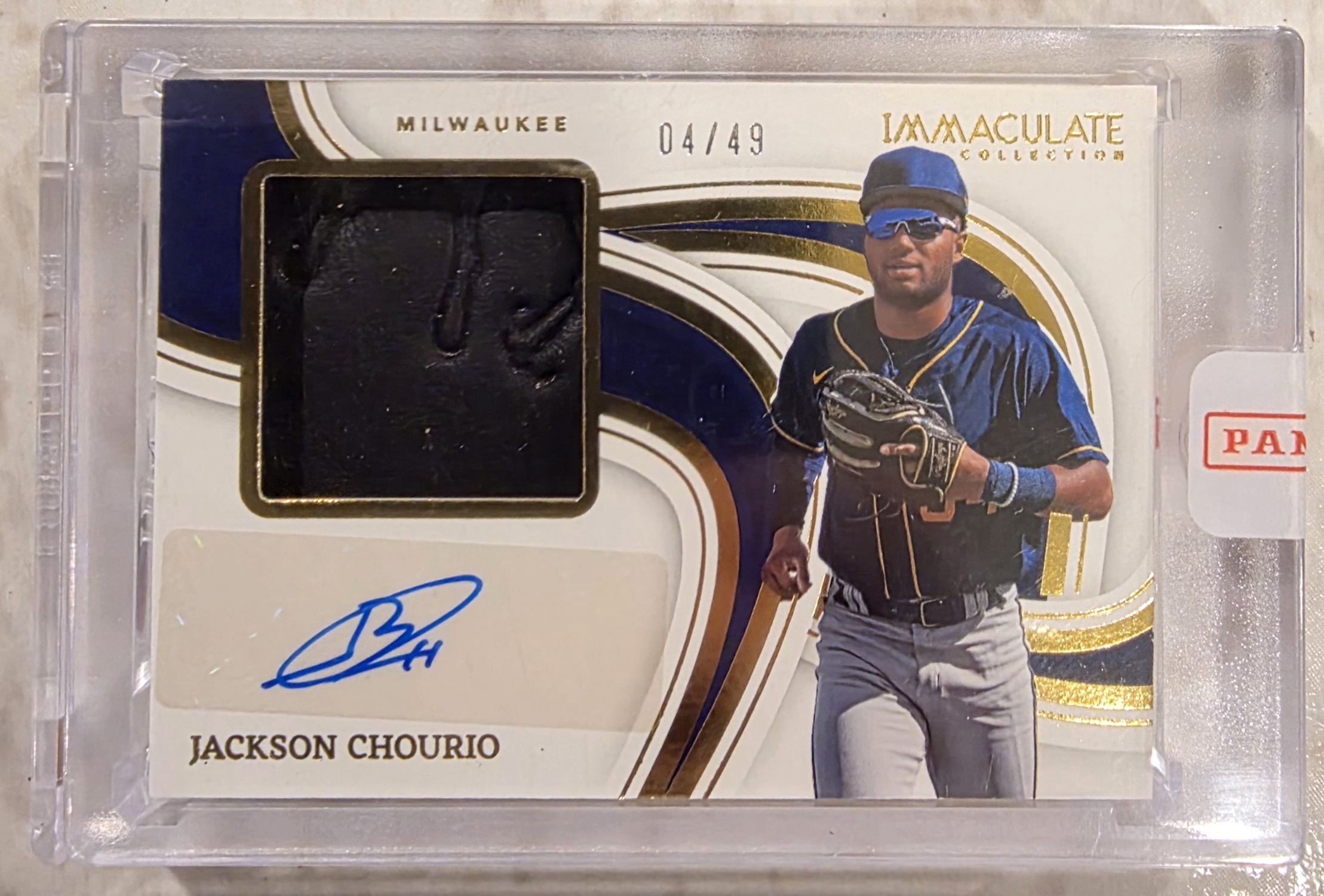 20261007_173010 2023 Panini Immaculate Jackson Chourio Auto with Glove Relic 04/49 - Image 1